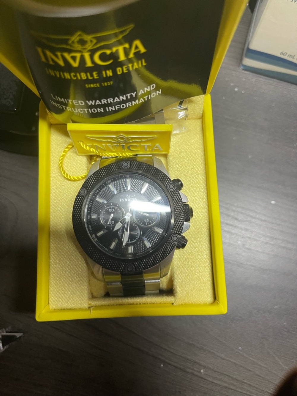 Invicta Black and Silver Stainless Chronograph pro diver model it is waterproof.